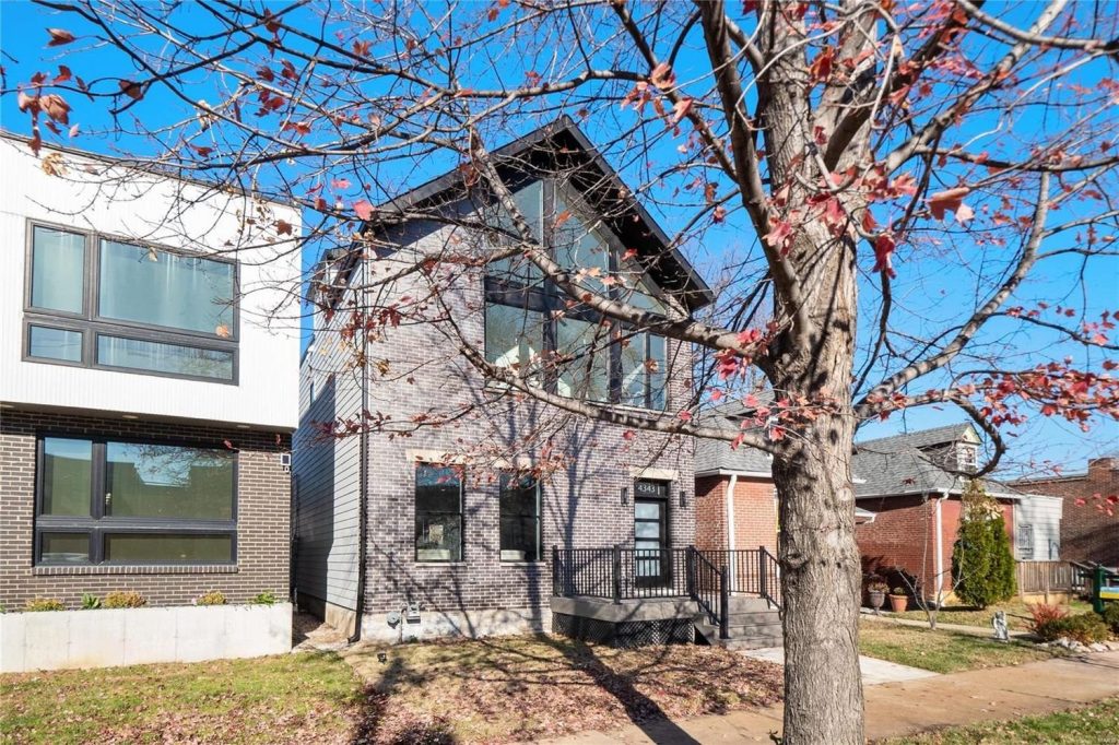 New build exterior with brick facade and gable roof