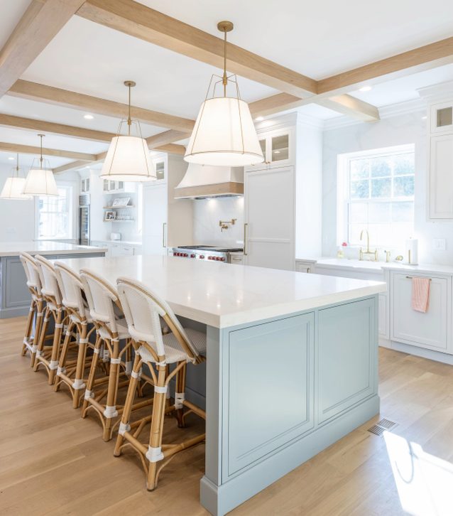 Custom kitchen with a painted island and coffered ceiling