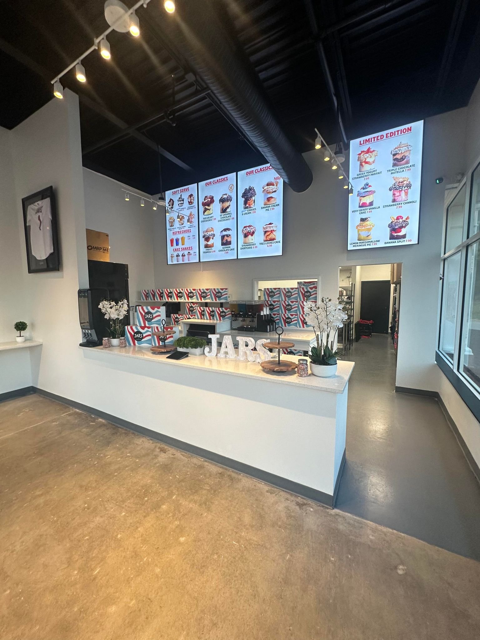 Service counter with illuminated menu boards