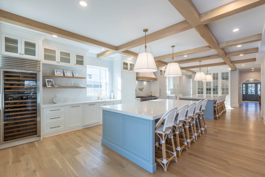 Kitchen with built-in wine refrigerator and open shelving