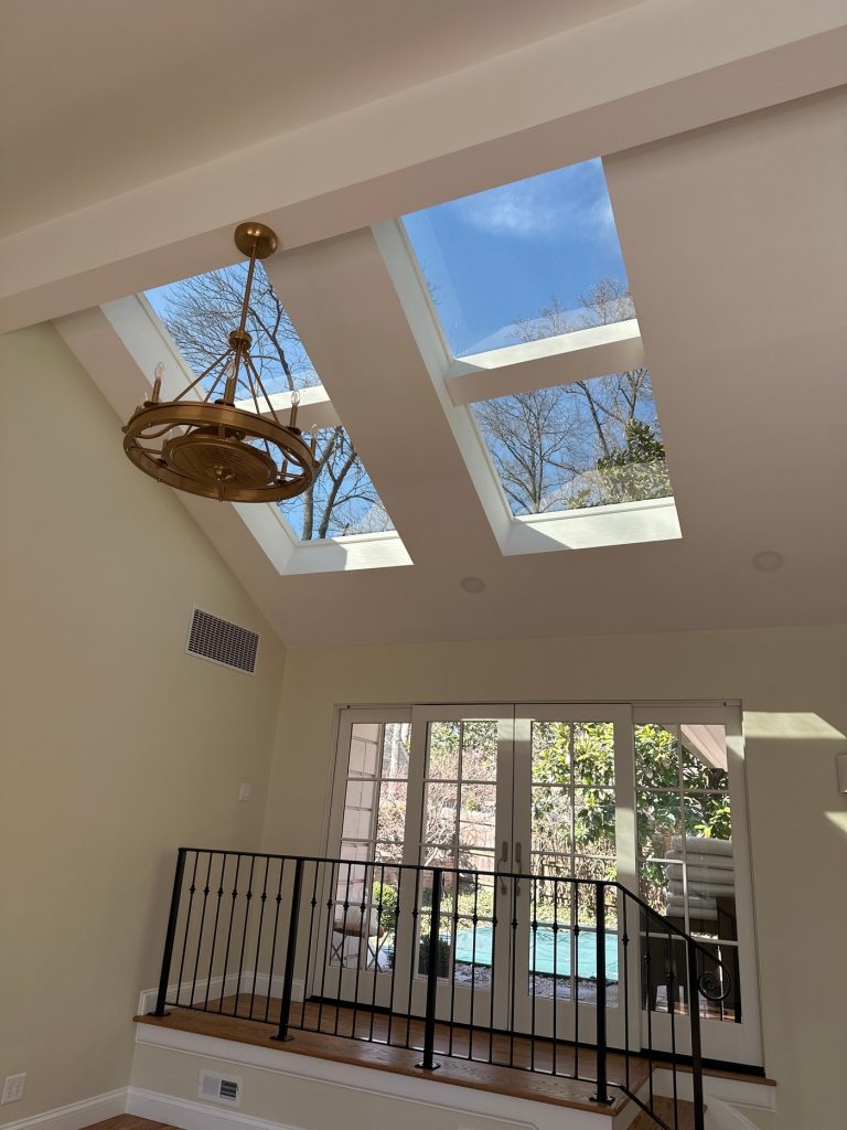 Skylights above French doors to the pool terrace