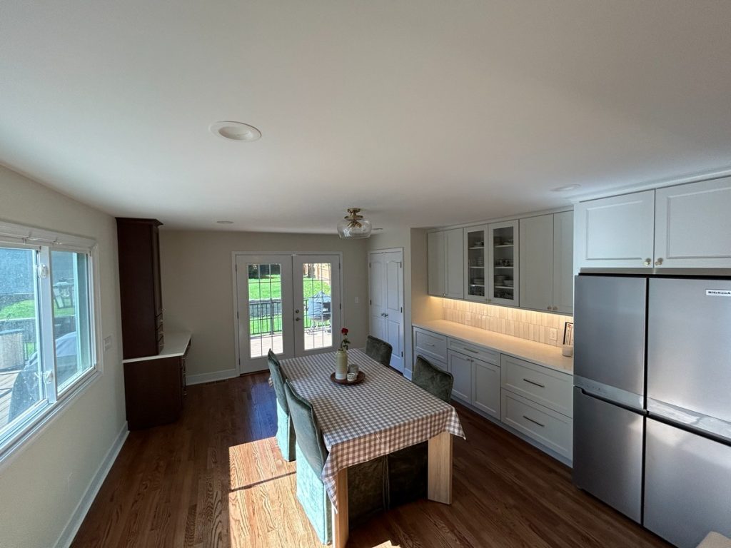 Dining area with built-in hutch and French doors