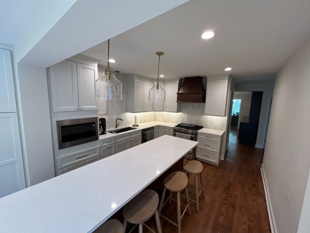 Kitchen breakfast bar with wooden stools