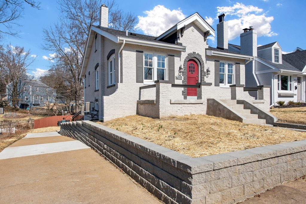 Front elevation with new block retaining wall