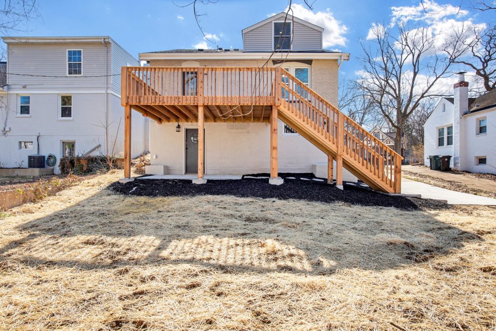 Back of the house with new deck and stair