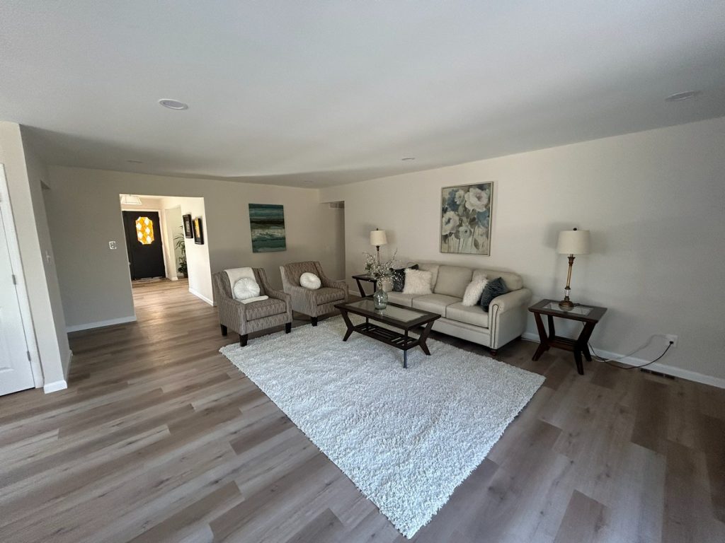 Living room looking through to the front entry