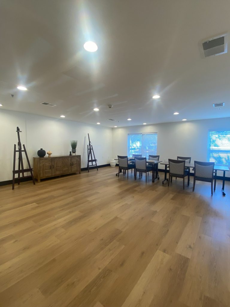 Art room with easels and a wood sideboard