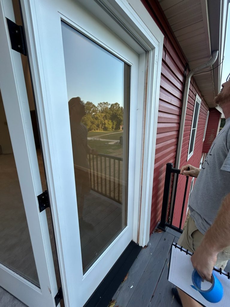 Patio door installation seen from the deck