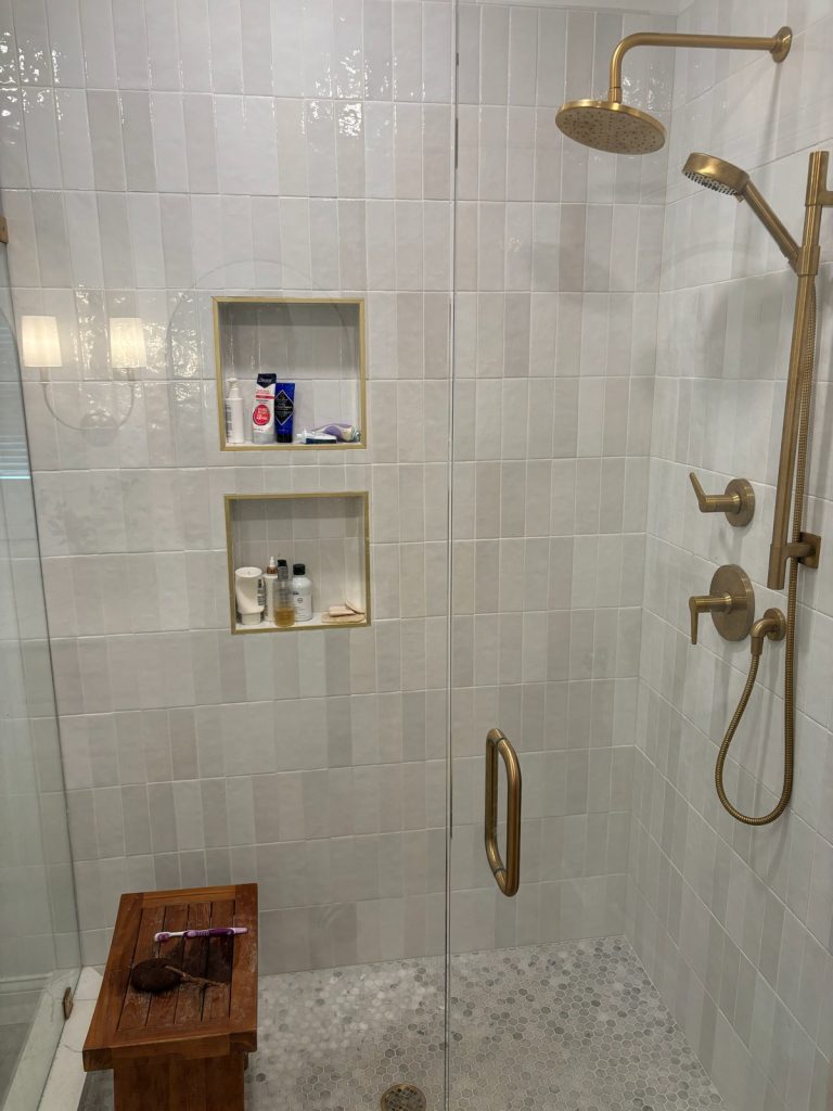 Shower niches and brass rainfall fittings
