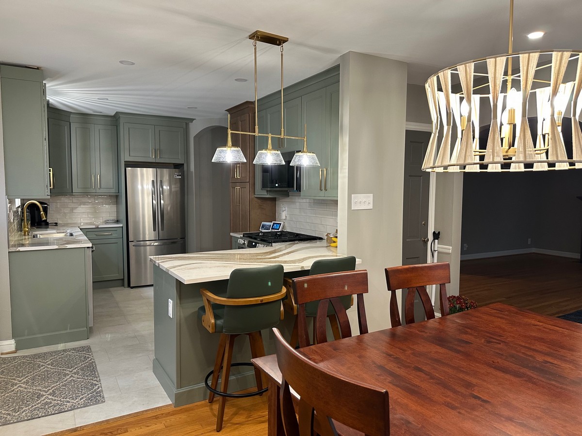 Kitchen peninsula seating beside the dining room