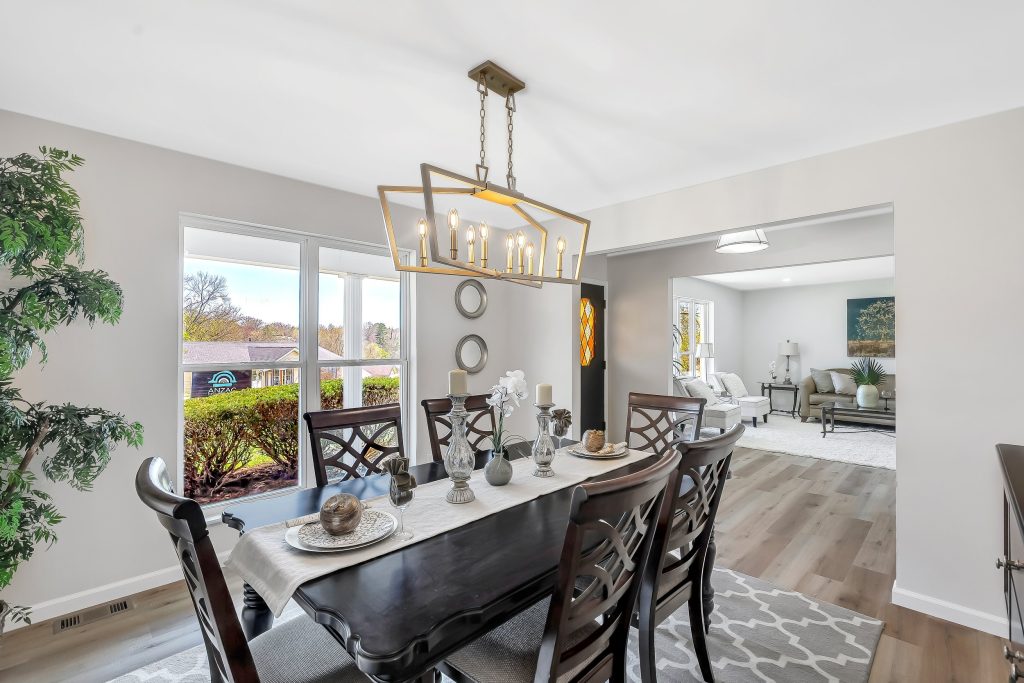 Dining table with kitchen beyond