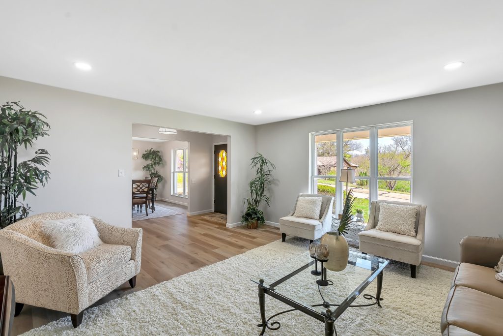 Living room with armchairs and glass coffee table