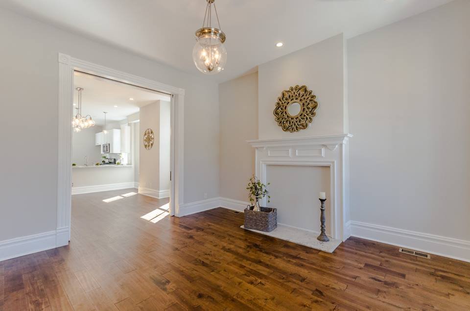 Living room with fireplace and lantern pendant light