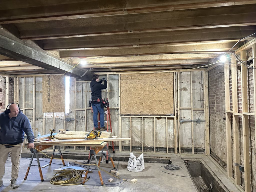 Interior framing and rough-in during a commercial design-build project