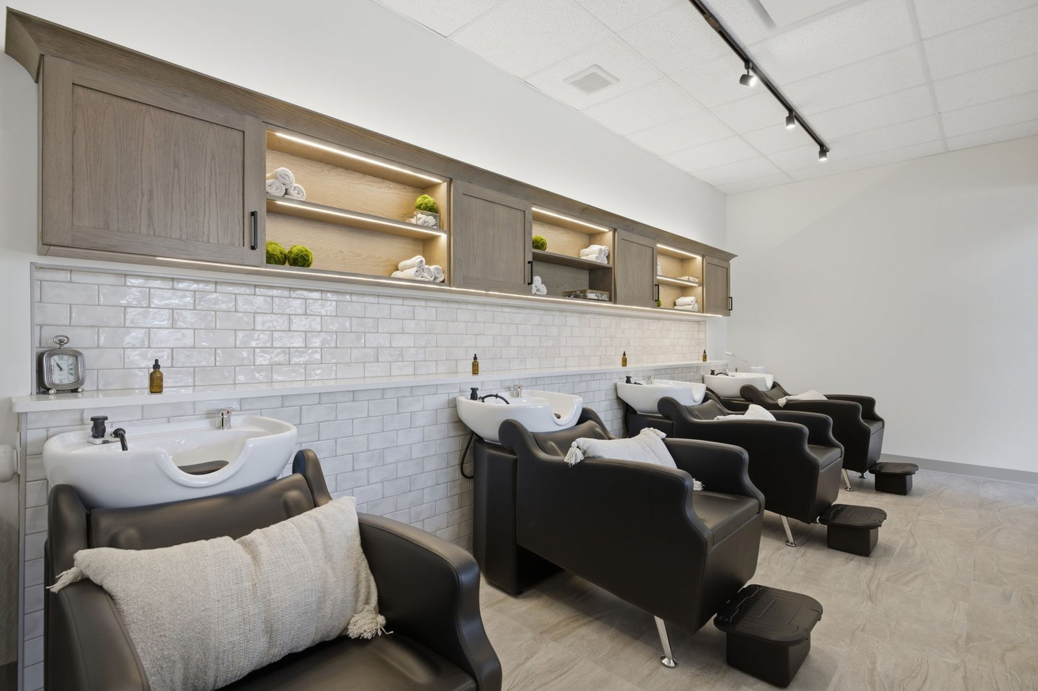 Completed commercial fit-out with custom millwork and wash stations