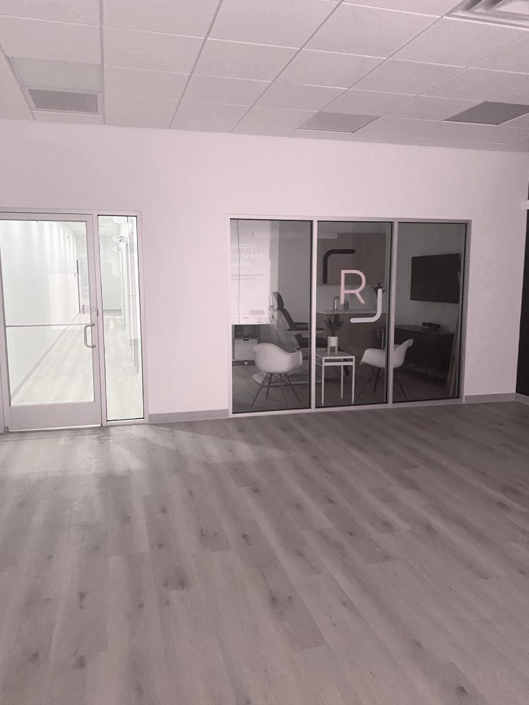 Clinic waiting area with glazed partition walls