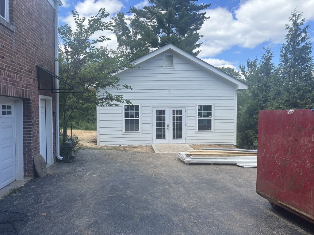 Completed workshop viewed from the driveway