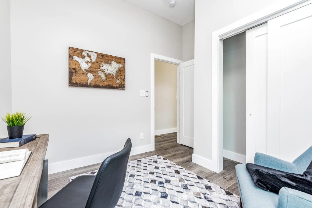 Study nook with desk and sliding closet doors