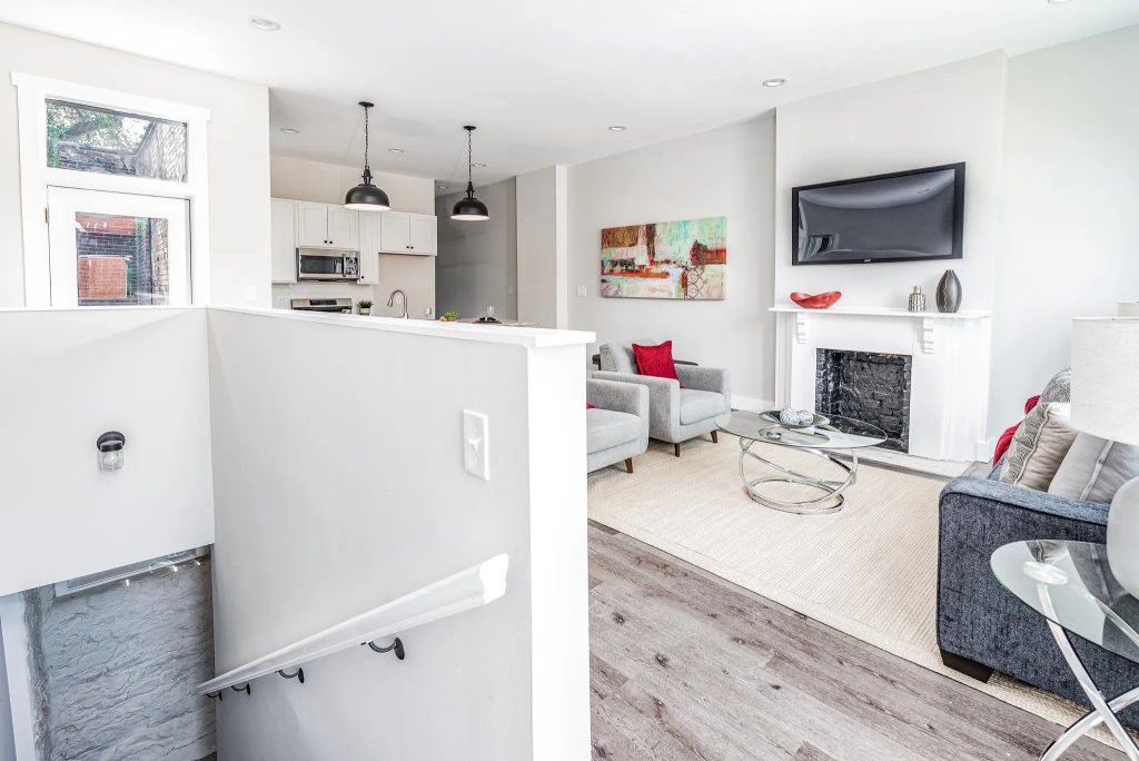 Living room with fireplace viewed from the stair landing