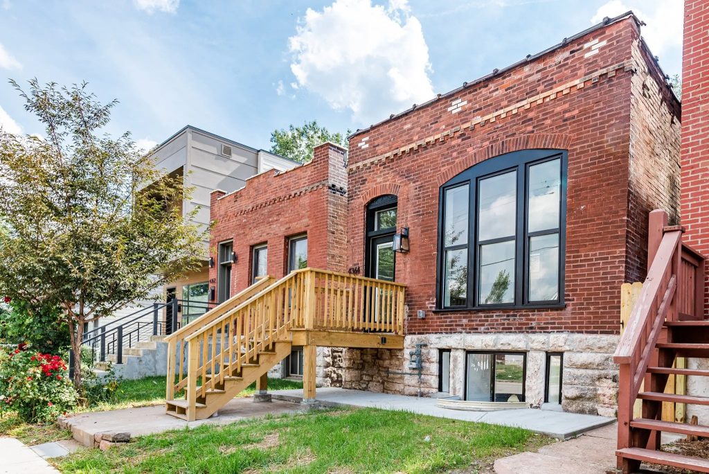 Brick house rear elevation with new wood staircase