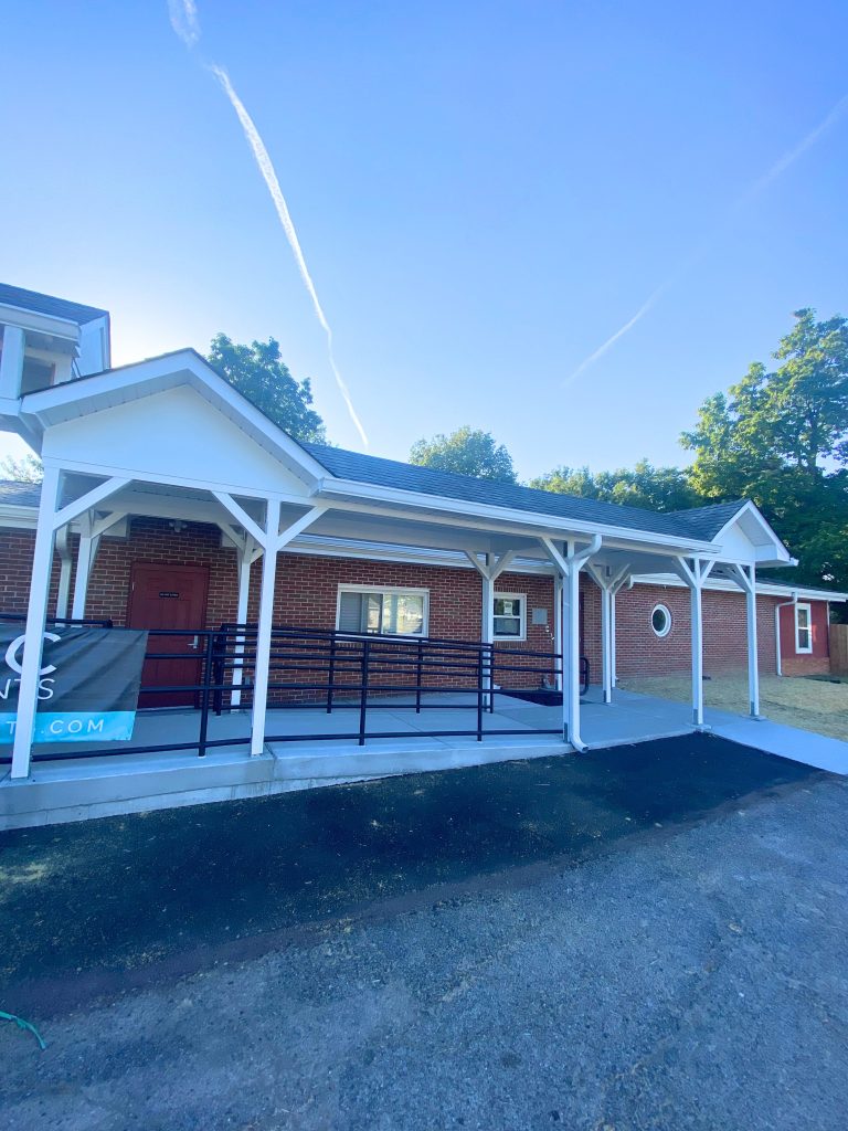 Covered entrance canopy and accessible ramp