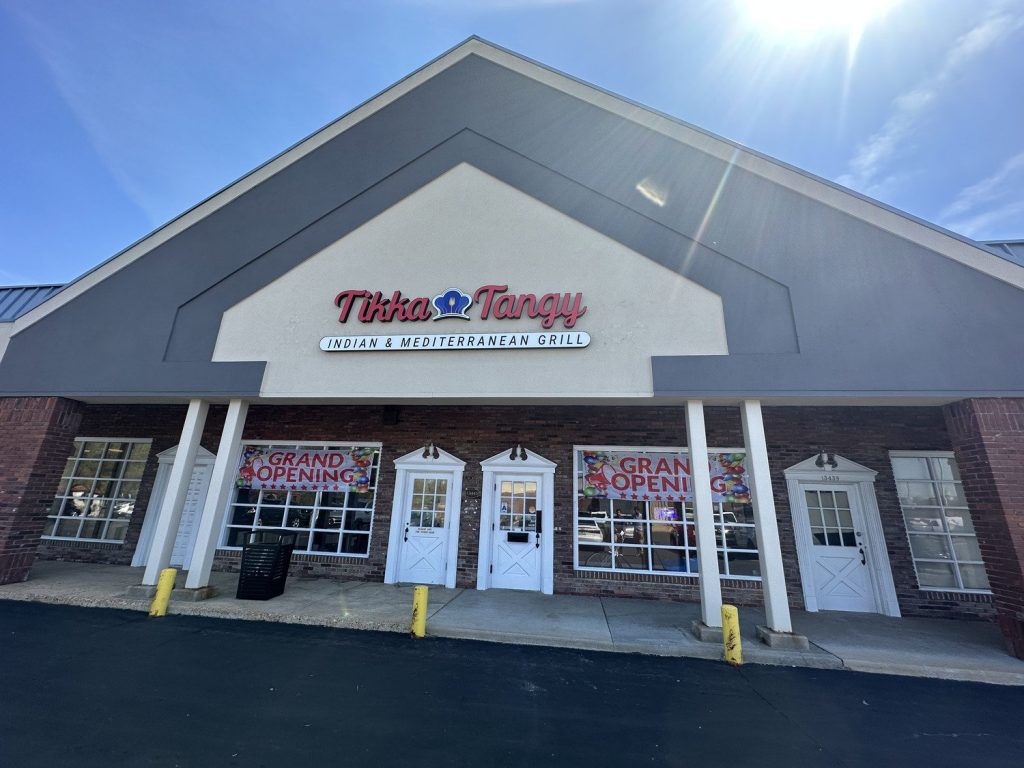 Tikka Tangy restaurant exterior with grand opening signage