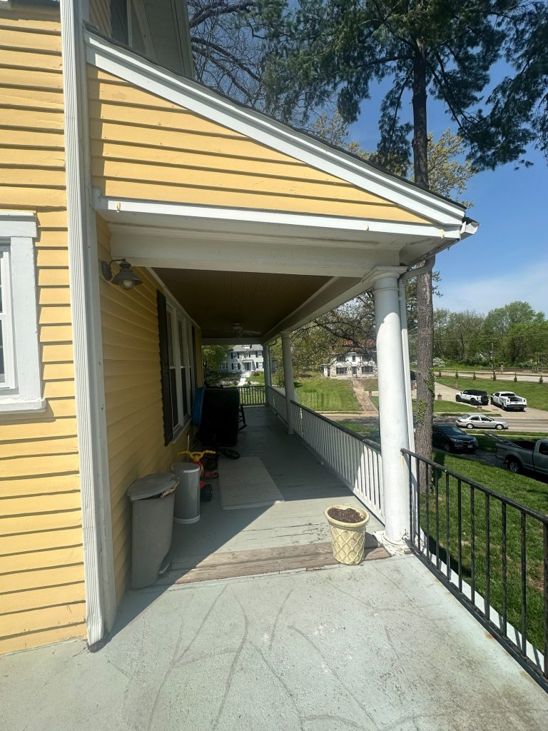 Covered breezeway between the original house and the garage