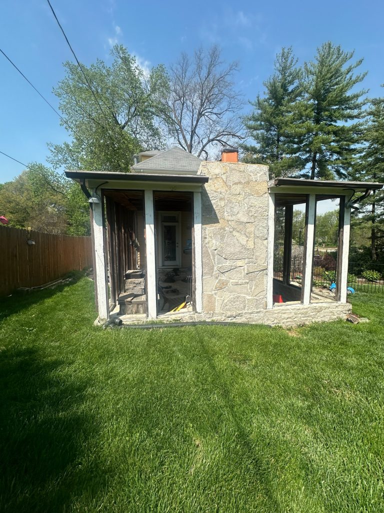 The original screened porch seen from the lawn