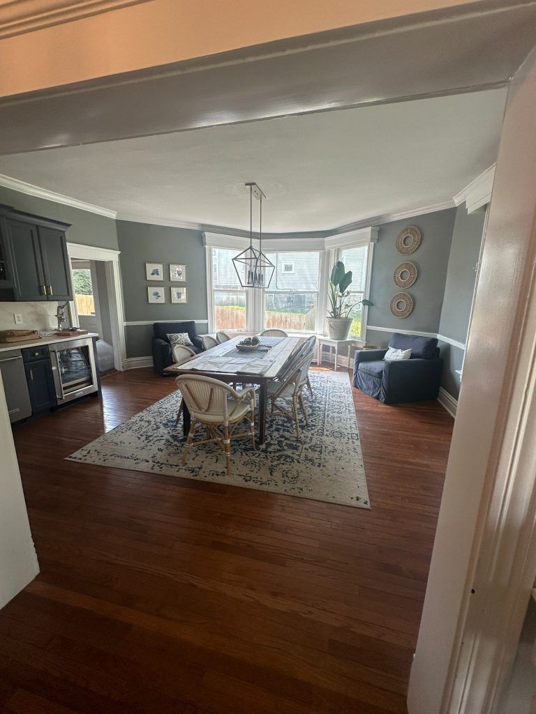 Original kitchen and dining area with dark hardwood flooring