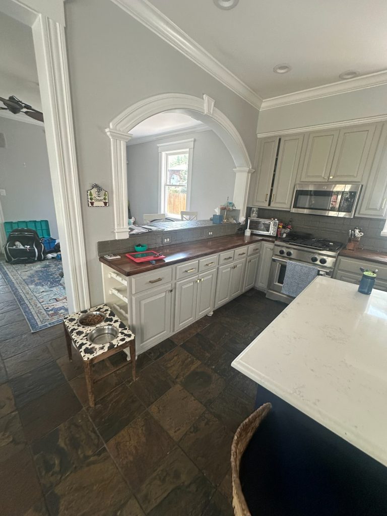Original kitchen looking back through the arched opening