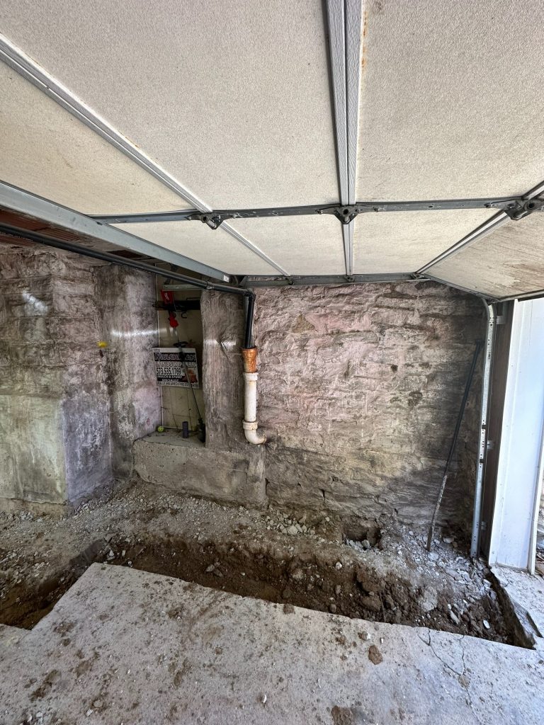 Excavation beside the original foundation wall