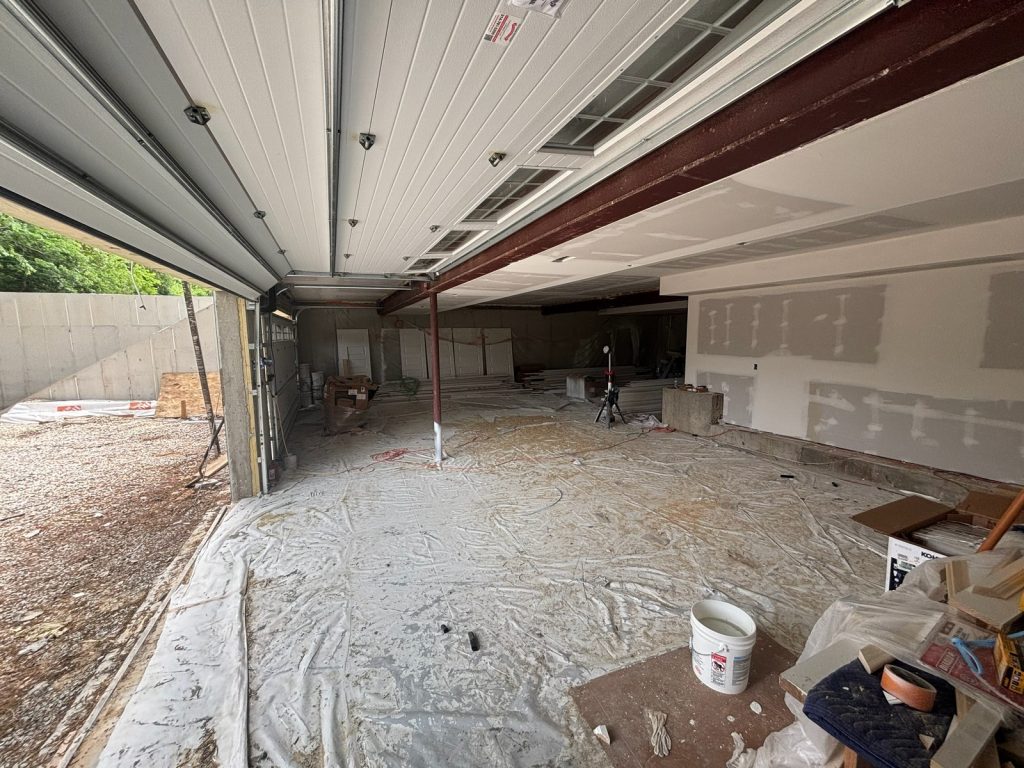 New concrete slab and steel beam in the lower level
