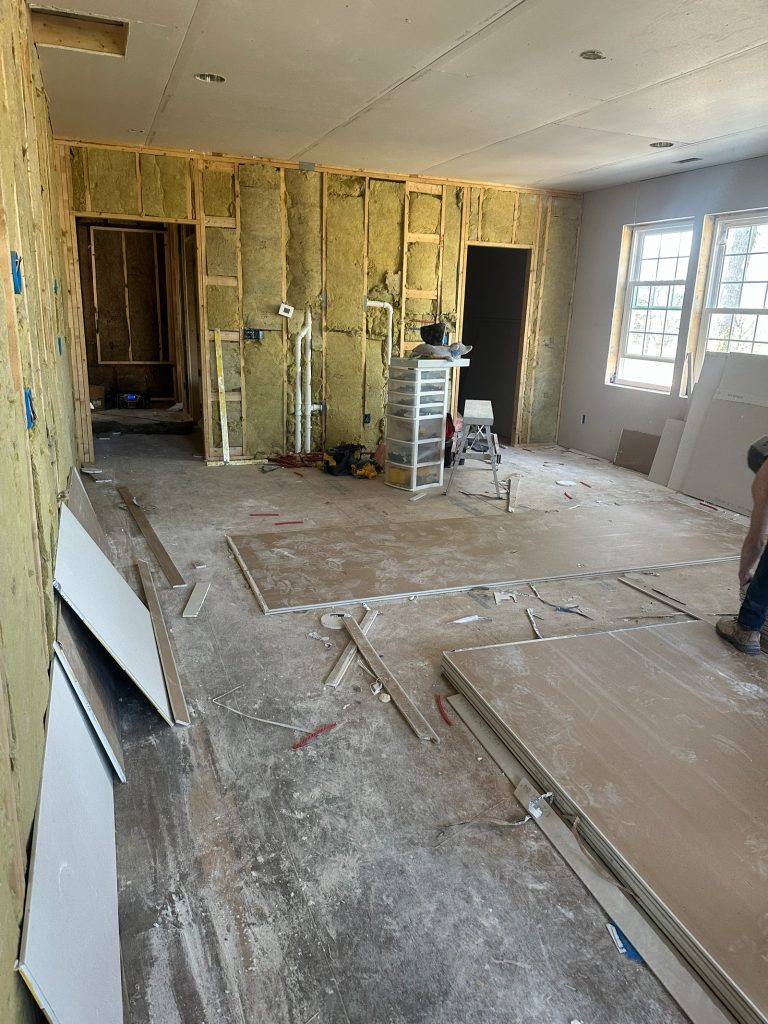 Interior room with subfloor down and insulation going in