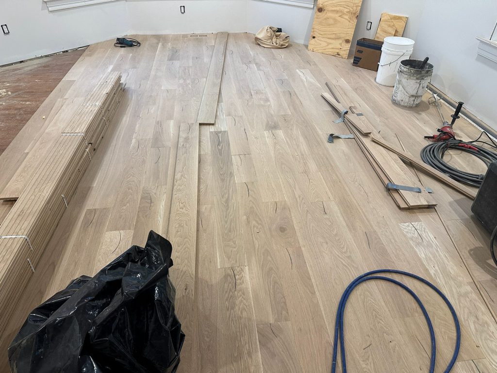White oak floorboards being laid
