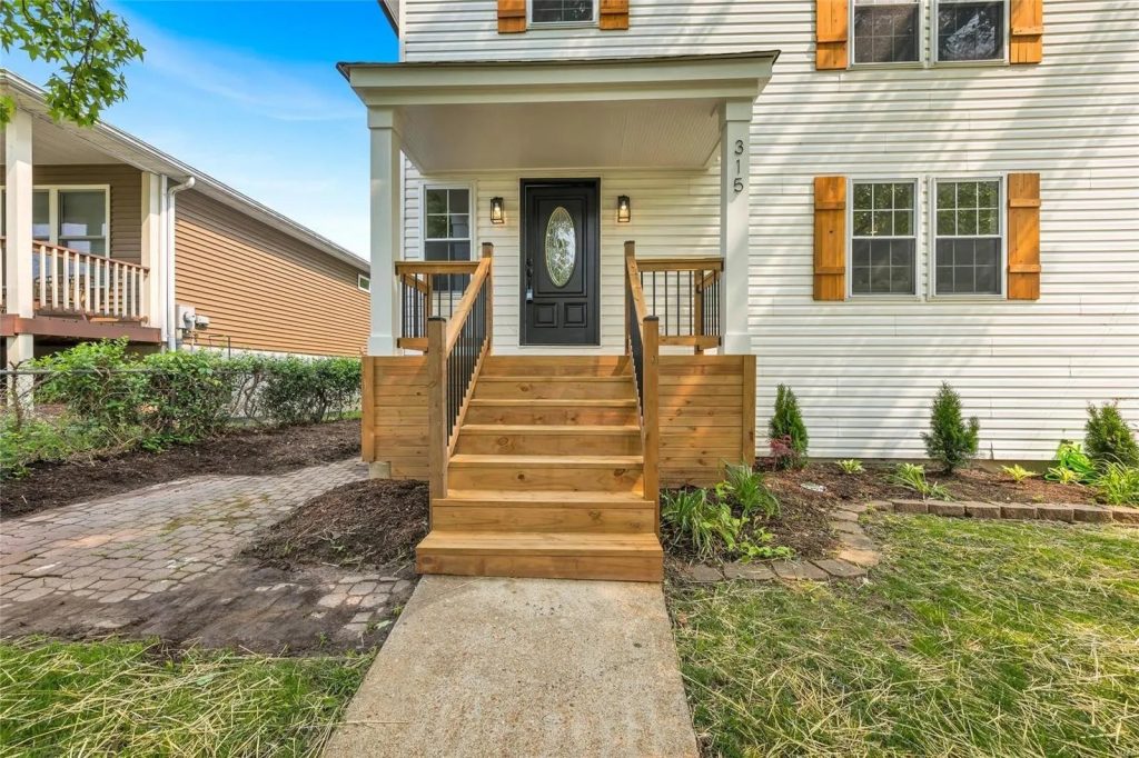 House exterior with new wood front steps