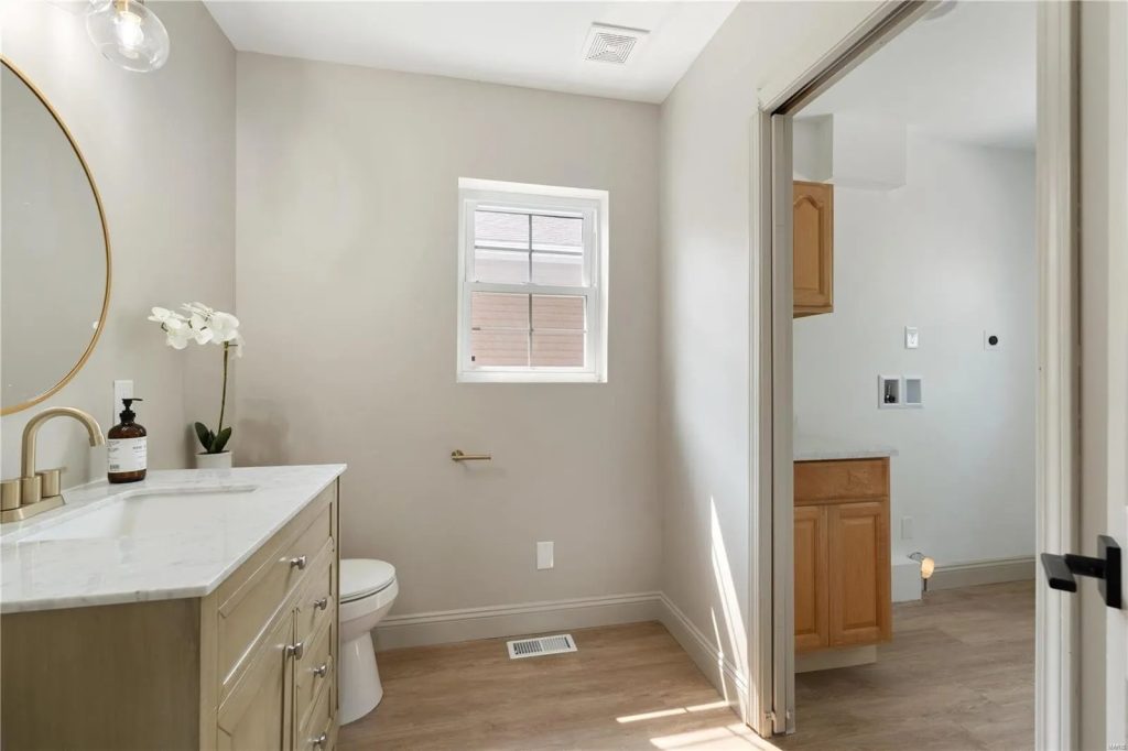 Powder room vanity beside the hallway