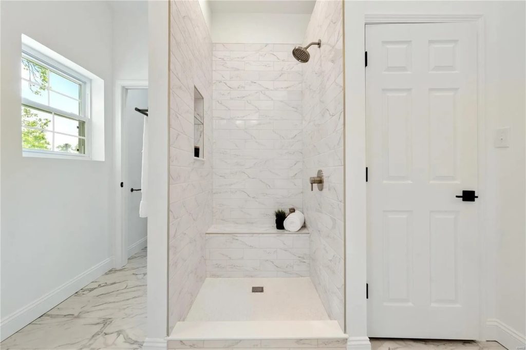 Marble tile walk-in shower