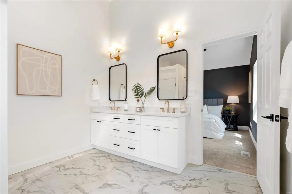 Bathroom double vanity with two black framed mirrors