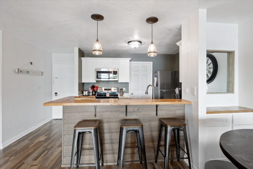 Breakfast bar with three stools