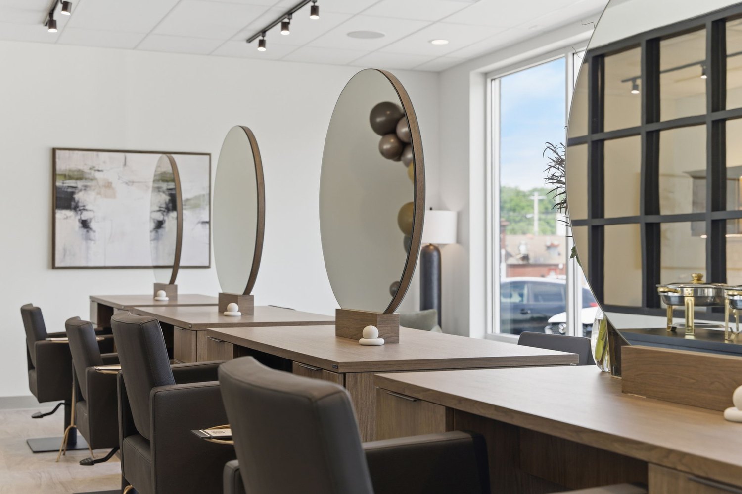 Fitted out commercial salon interior with styling stations and mirrors