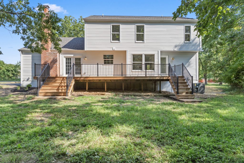 Rear elevation with raised deck and lawn
