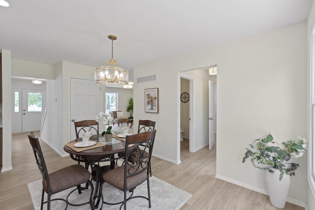 Breakfast table with doorways beyond